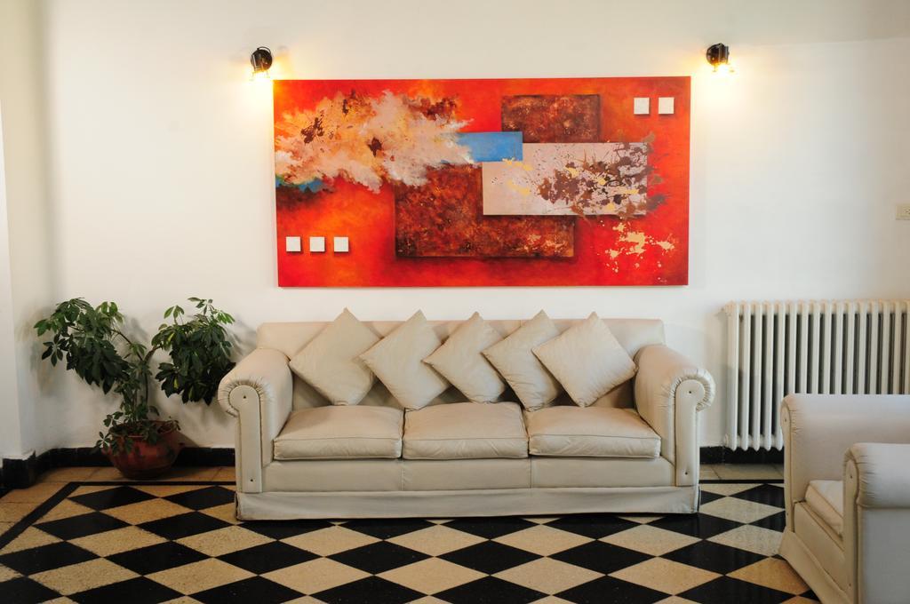 Hostal De La Costa Вилья-Карлос-Пас Экстерьер фото